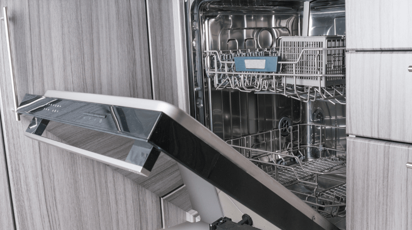 Empty dishwasher machine with opened door